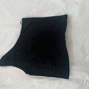 One shoulder black top